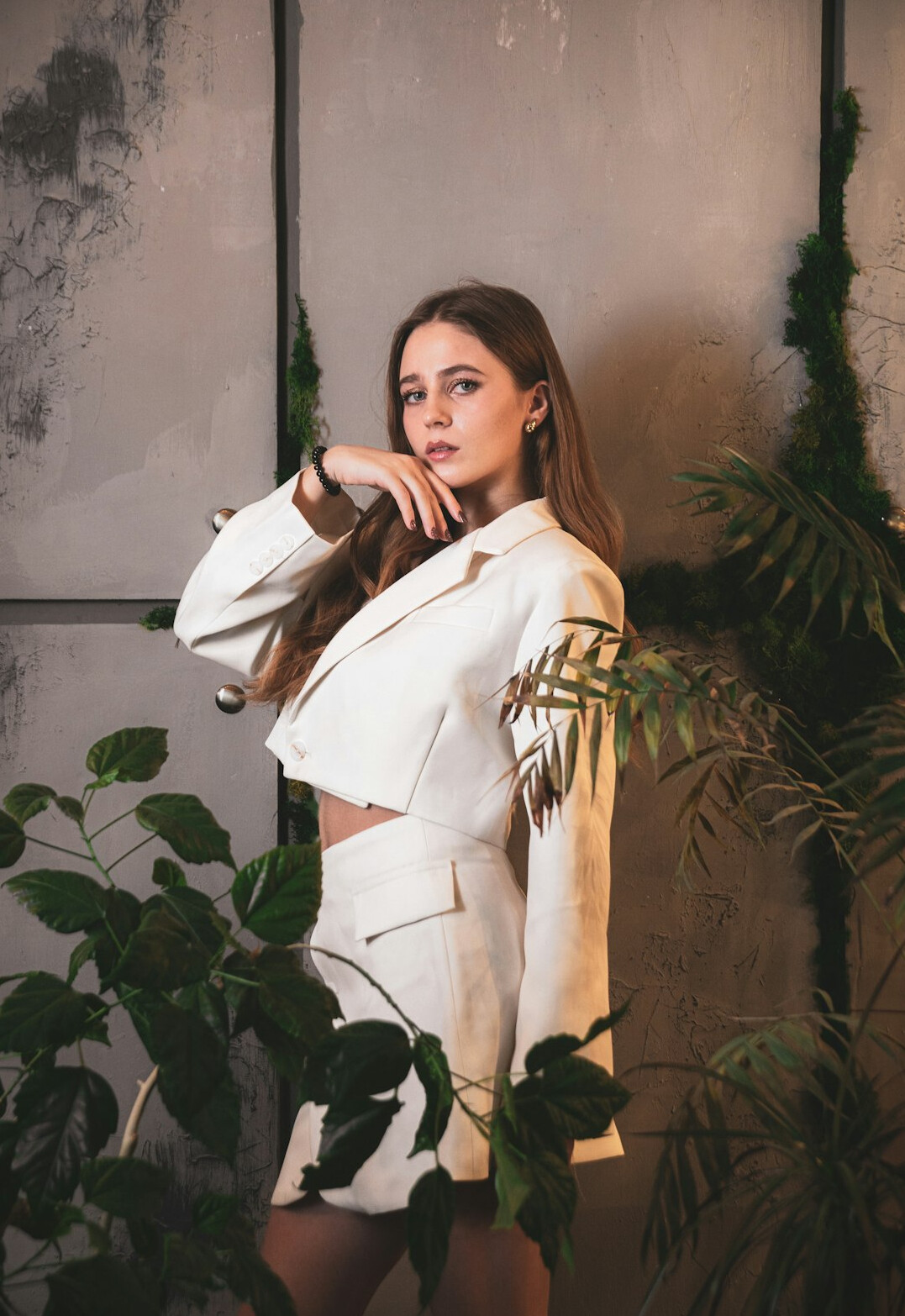 Professional portrait of a smiling woman in a blazer