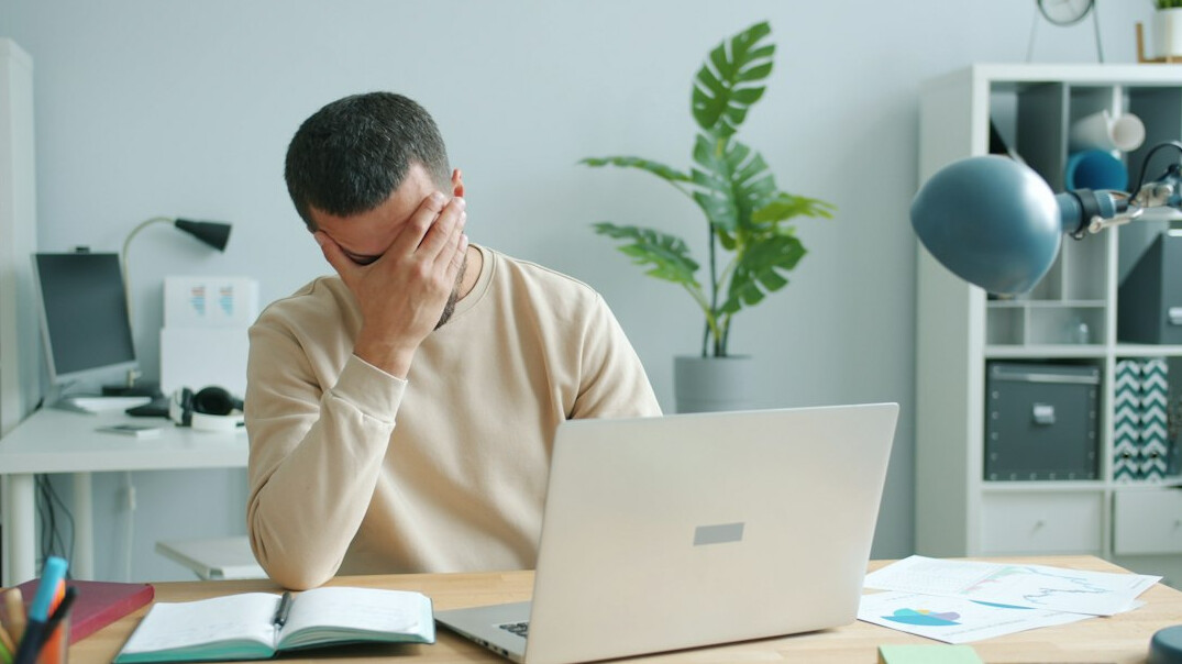 tired employee at desk