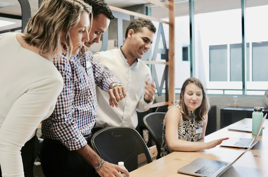 healthy employees in office meeting